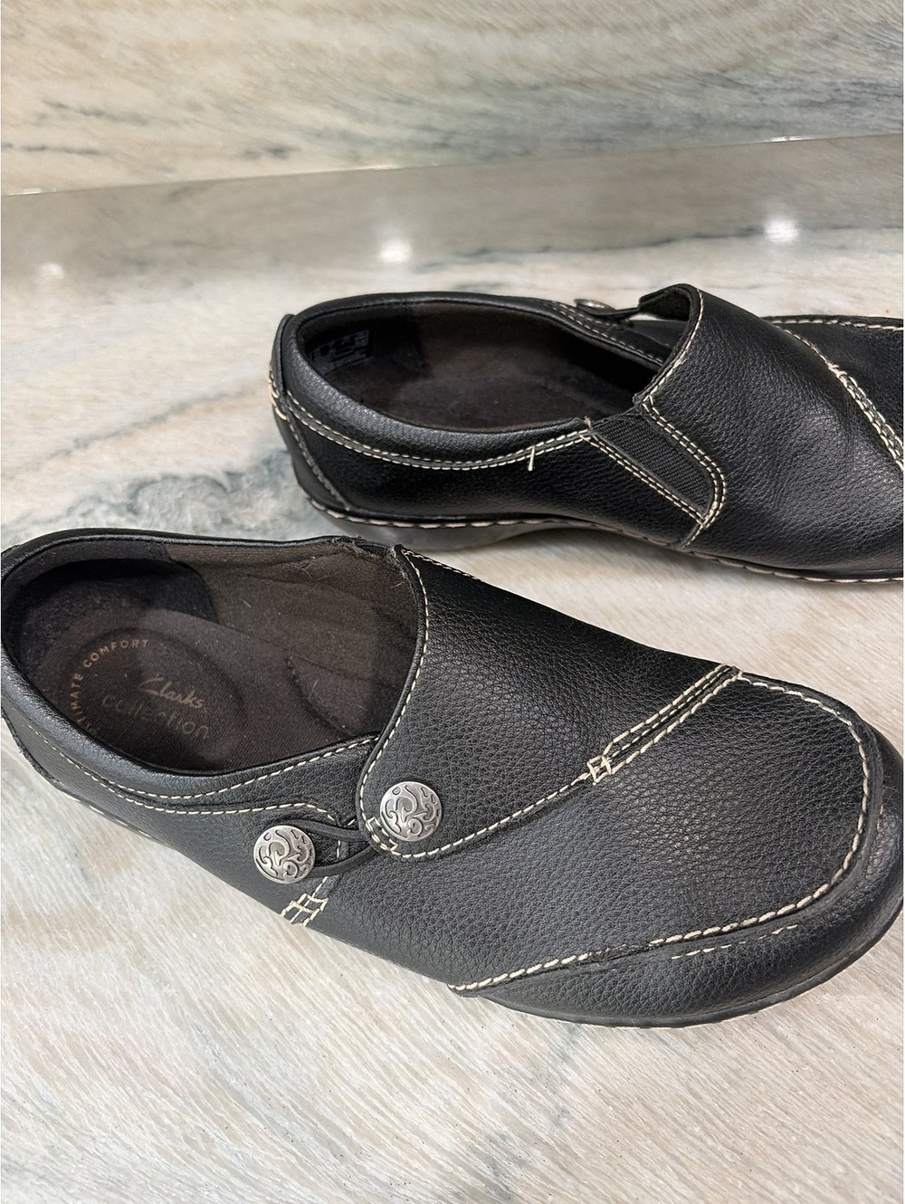 Women’s size 7 Clarks Black Comfort Slip-On Shoes with Button Detail - Size 8